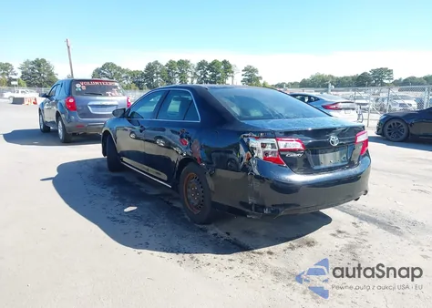 2014 Toyota Camry Le z USA, uszkodzony, nr VIN 4T1BF1FK2EU823028